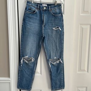 Ladies distressed boyfriend jeans.